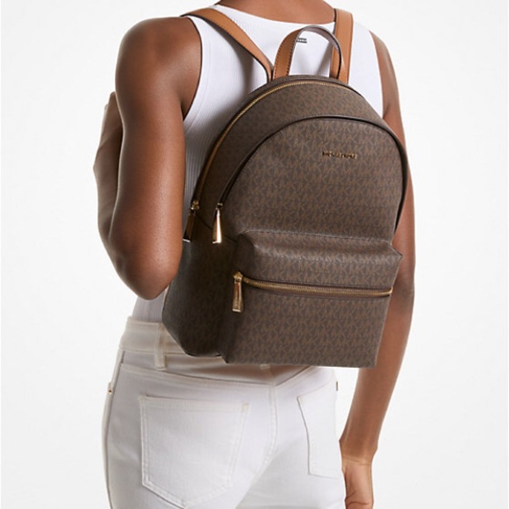 Michael Kors Sally Medium logo backpack with tablet pouch.